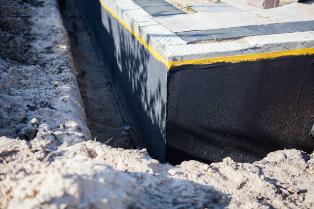 Professional Emergency Waterproofing technician working in Hoytville, OH